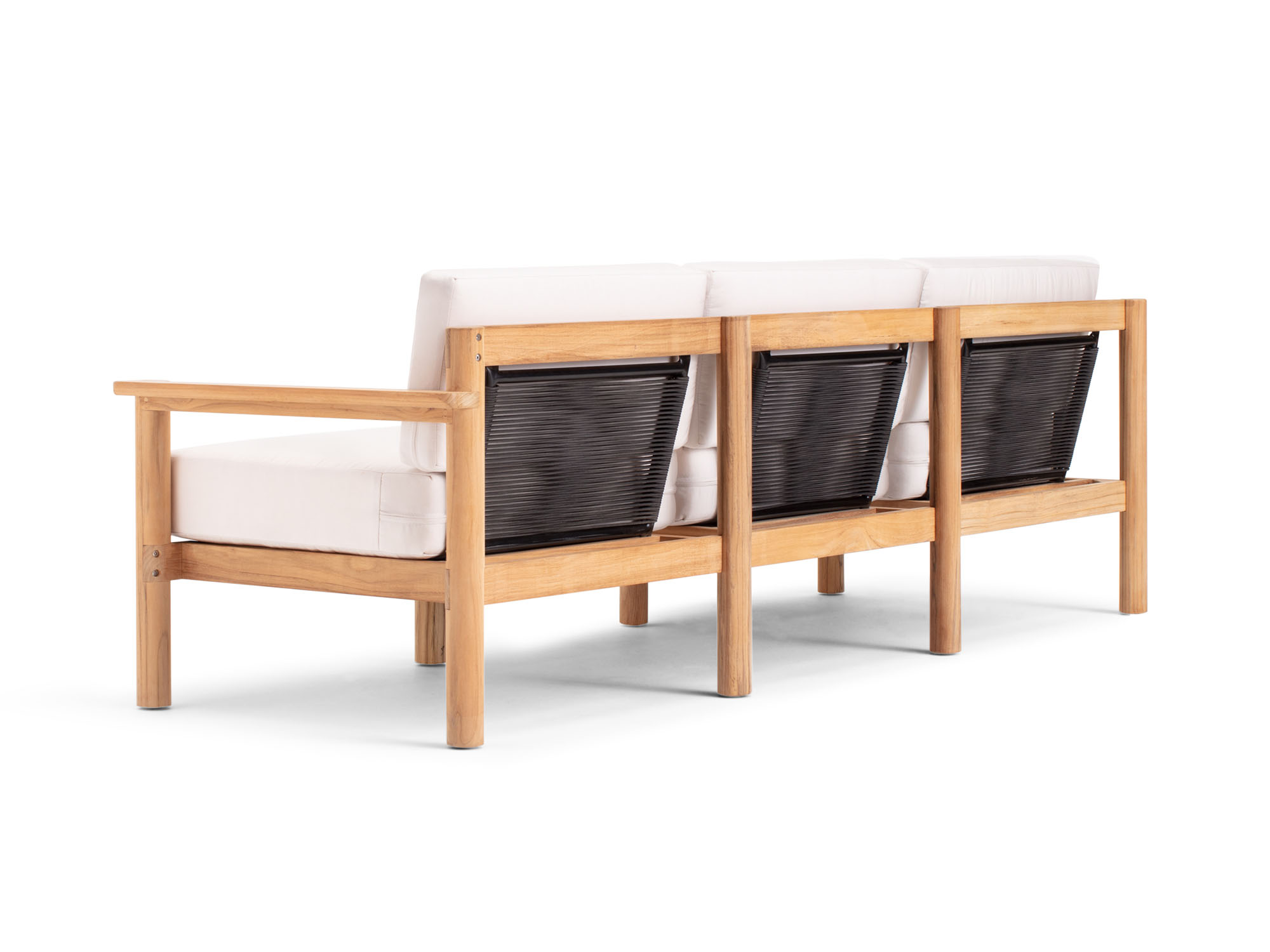 Back angle view of outdoor sofa with white cushions
